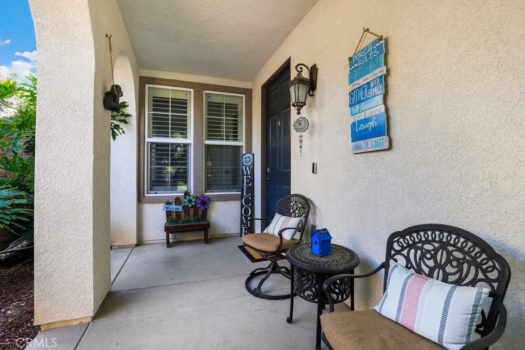 31319 Locust Court Temecula, CA 92592 - Photo 3 of 75 a living room with furniture and a large window