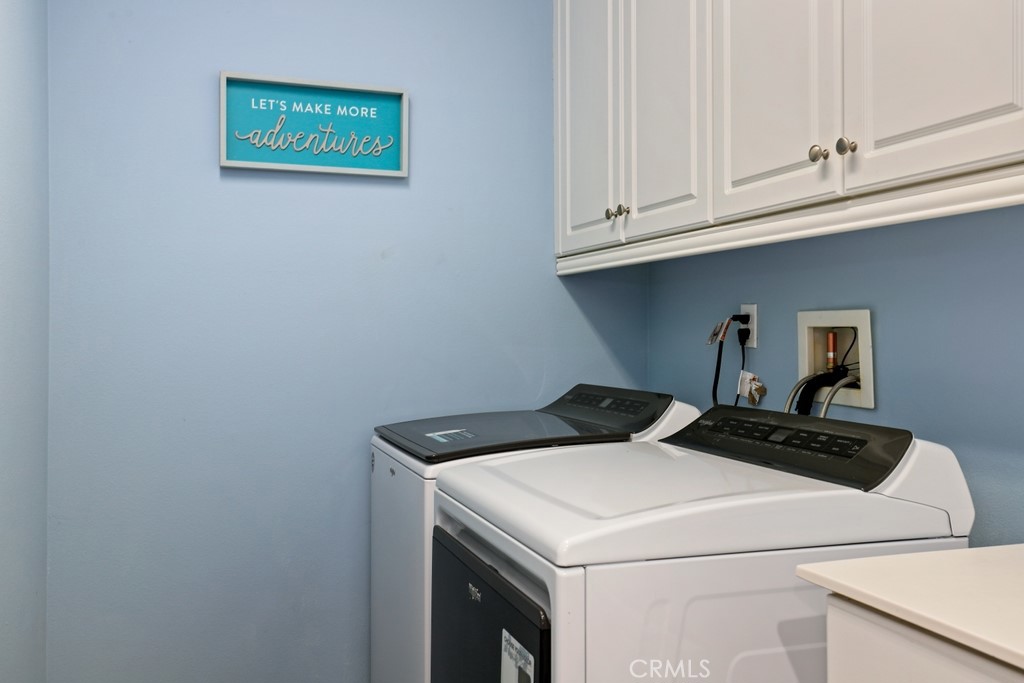31319 Locust Court Temecula, CA 92592 - Photo 42 of 75 a utility room with dryer and washer