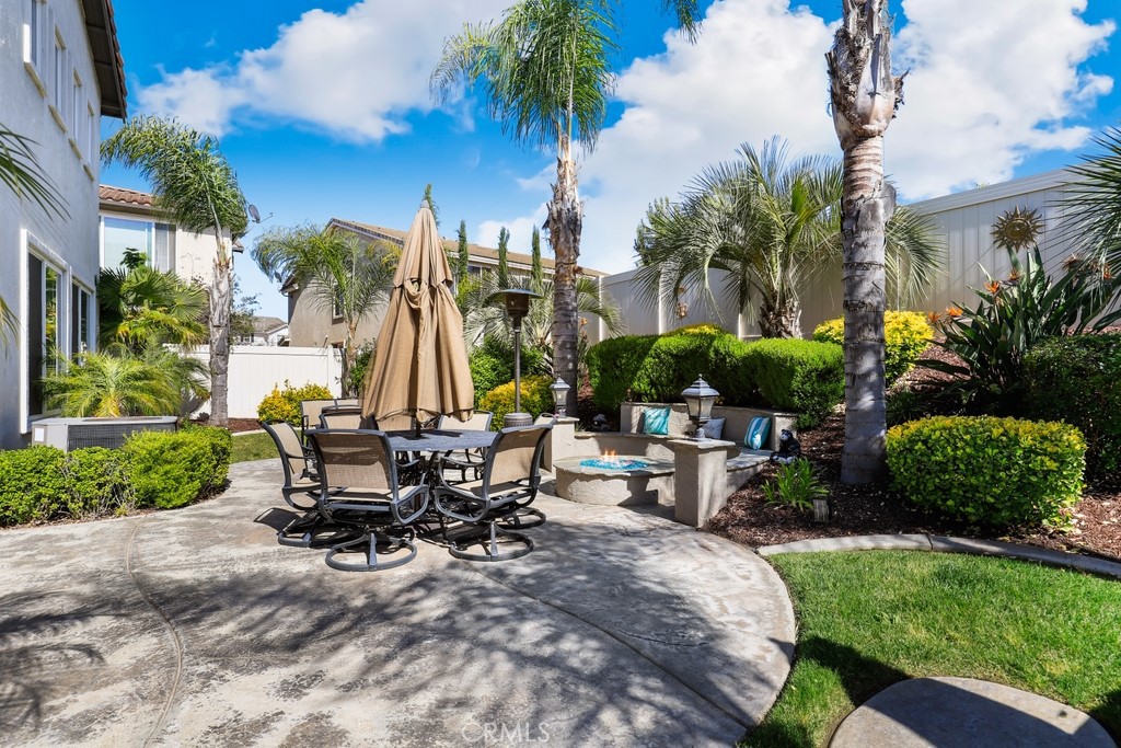 31319 Locust Court Temecula, CA 92592 - Photo 47 of 75 a view of outdoor space with seating area and trees
