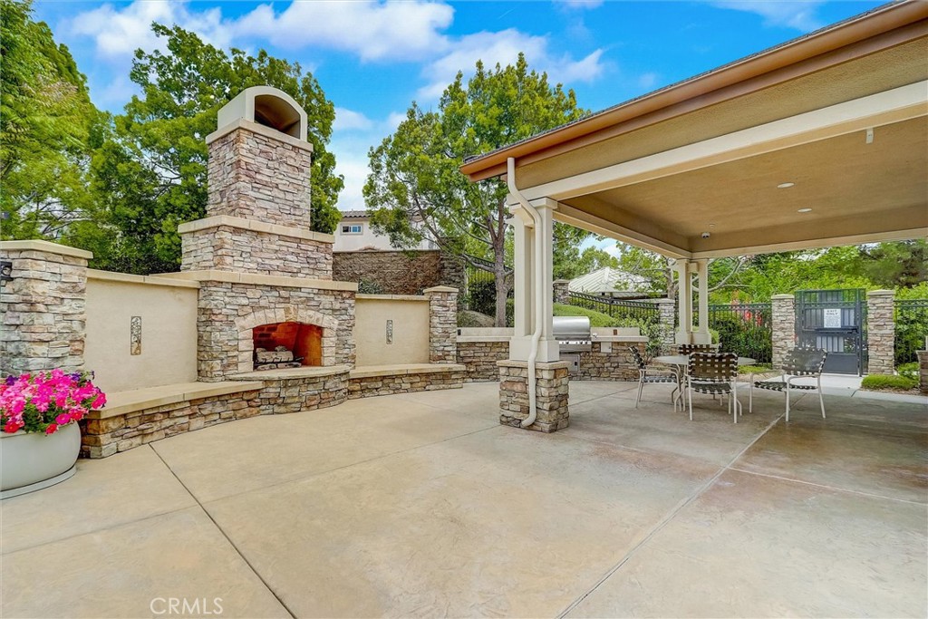 31319 Locust Court Temecula, CA 92592 - Photo 68 of 75 a building outdoor space with patio furniture and potted plants