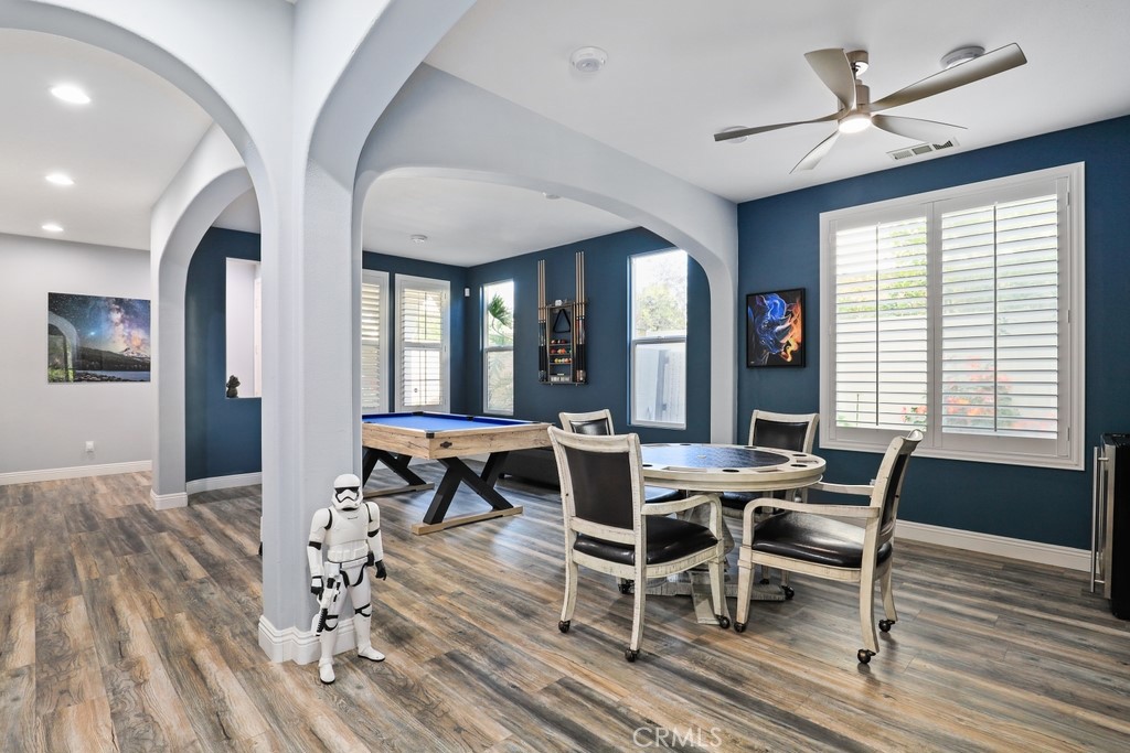 31319 Locust Court Temecula, CA 92592 - Photo 7 of 75 a view of a dining room with furniture window and wooden floor