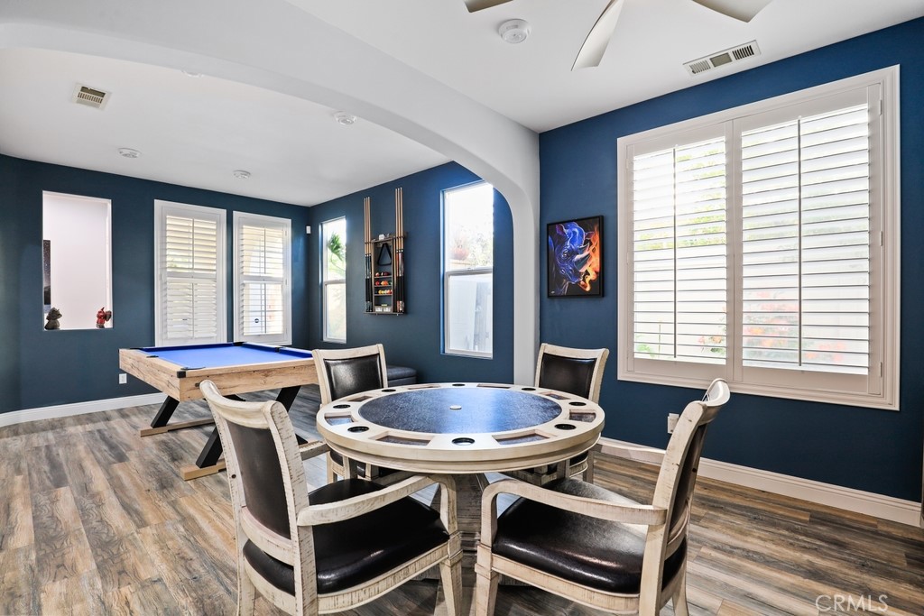 31319 Locust Court Temecula, CA 92592 - Photo 8 of 75 a view of a dining room with furniture window and wooden floor