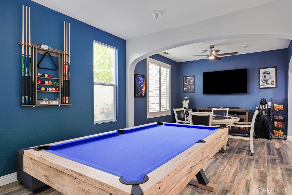 31319 Locust Court Temecula, CA 92592 - Photo 10 of 75 a room with pool table flat screen tv and windows