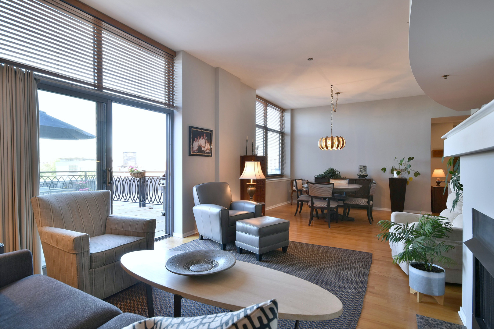 1201 West Adams Street, Unit 411 Chicago, IL 60607 - Photo 17 of 40 a living room with furniture and a large window