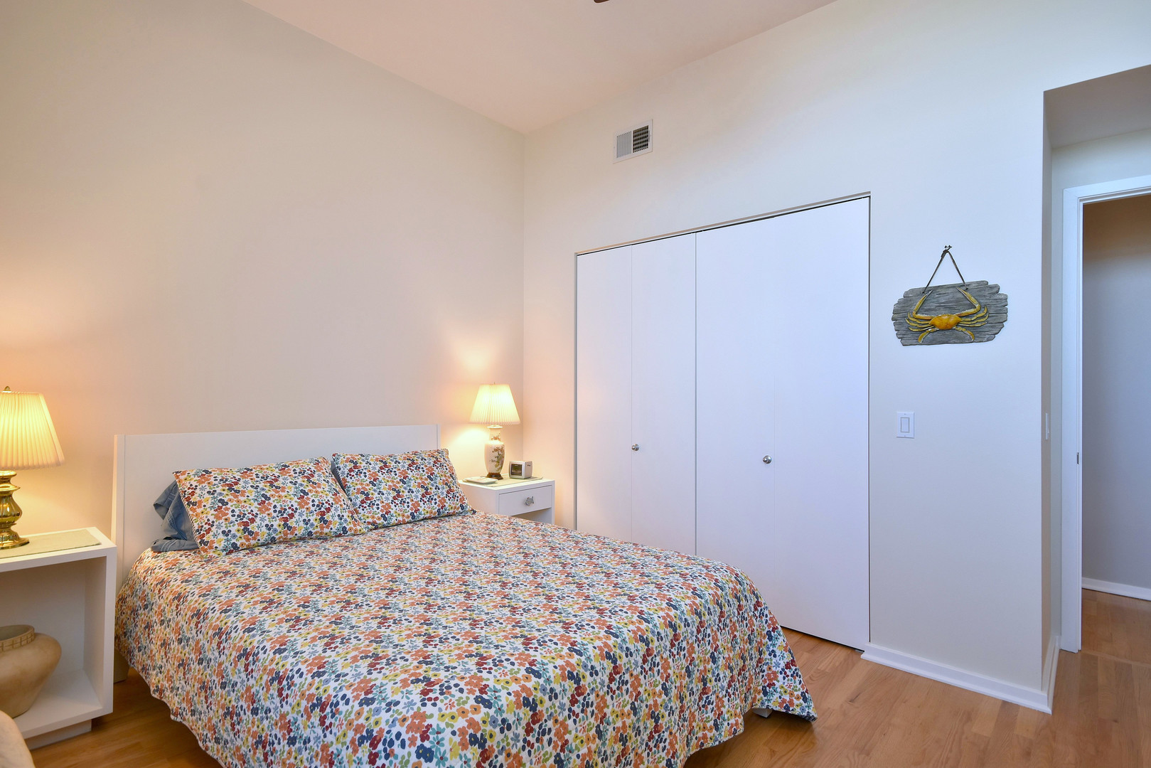1201 West Adams Street, Unit 411 Chicago, IL 60607 - Photo 23 of 40 a bedroom with a bed and lamps
