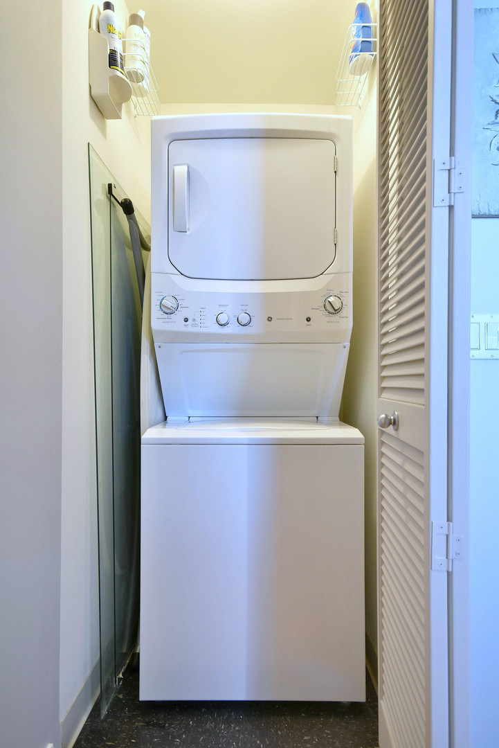 1201 West Adams Street, Unit 411 Chicago, IL 60607 - Photo 31 of 40 a close up view of washer and dryer