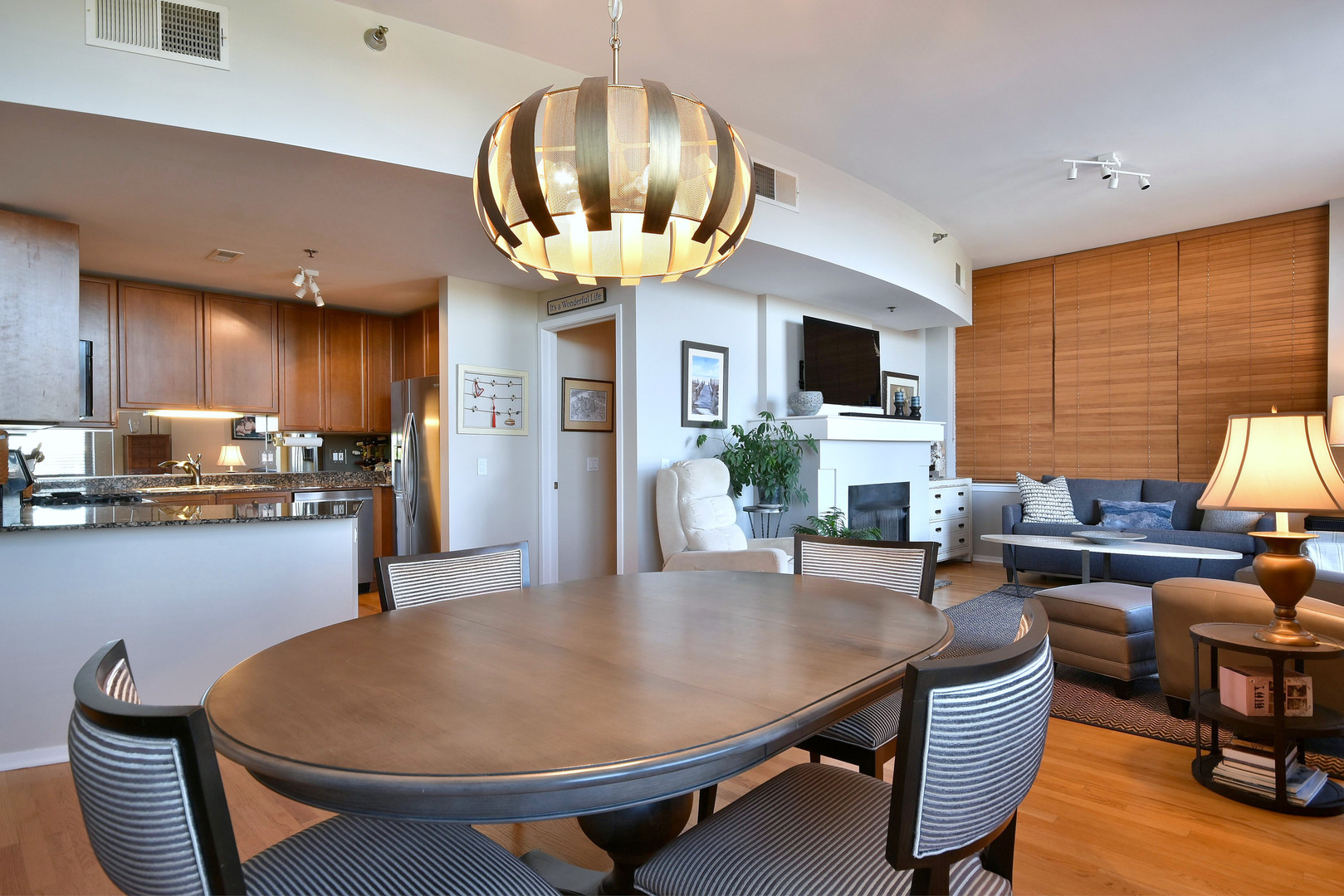 1201 West Adams Street, Unit 411 Chicago, IL 60607 - Photo 6 of 40 a kitchen with a table and chairs in it