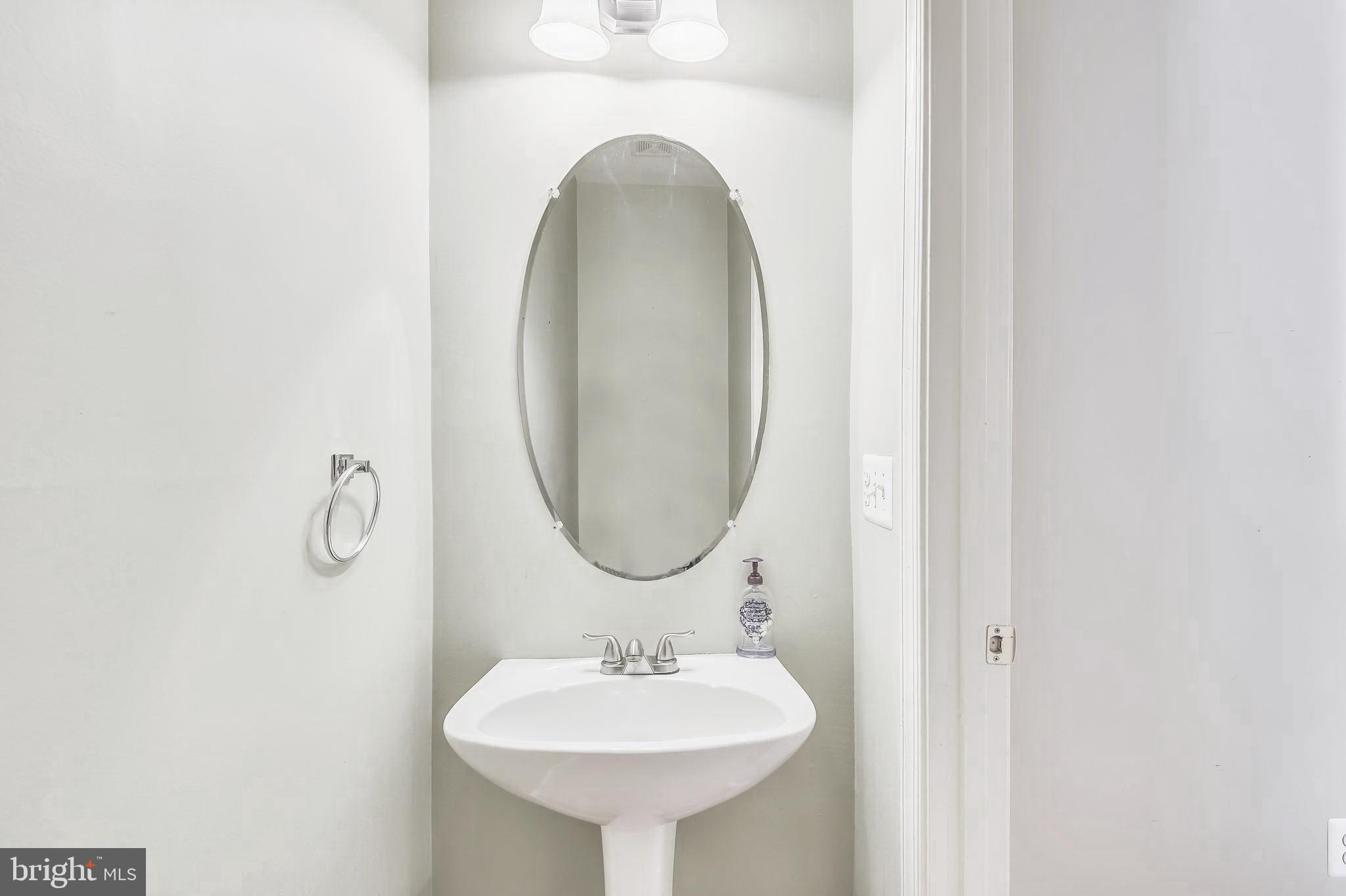 1307 Windleaf Drive, Unit 136 Reston, VA 20194 - Photo 14 of 47 powder room on main floor