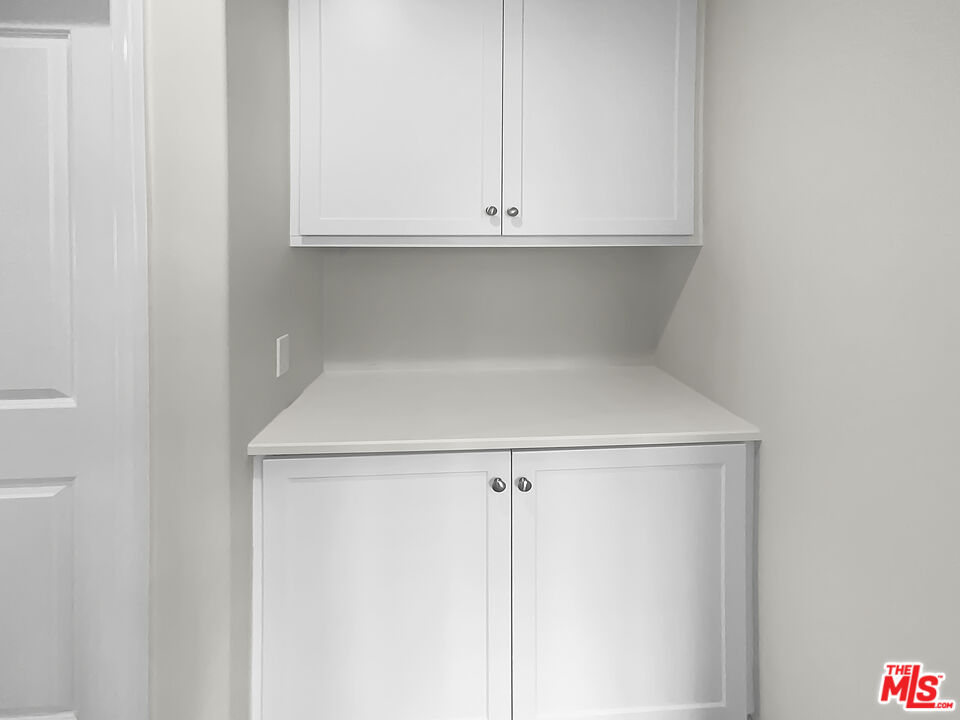 50 Evening Sun Irvine, CA 92620 - Photo 14 of 15 a view of cabinets and wooden floor