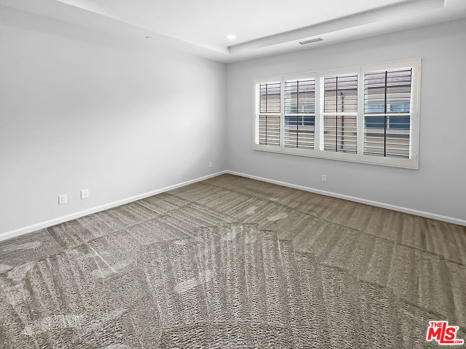 50 Evening Sun Irvine, CA 92620 - Photo 3 of 15 a view of an empty room with a window