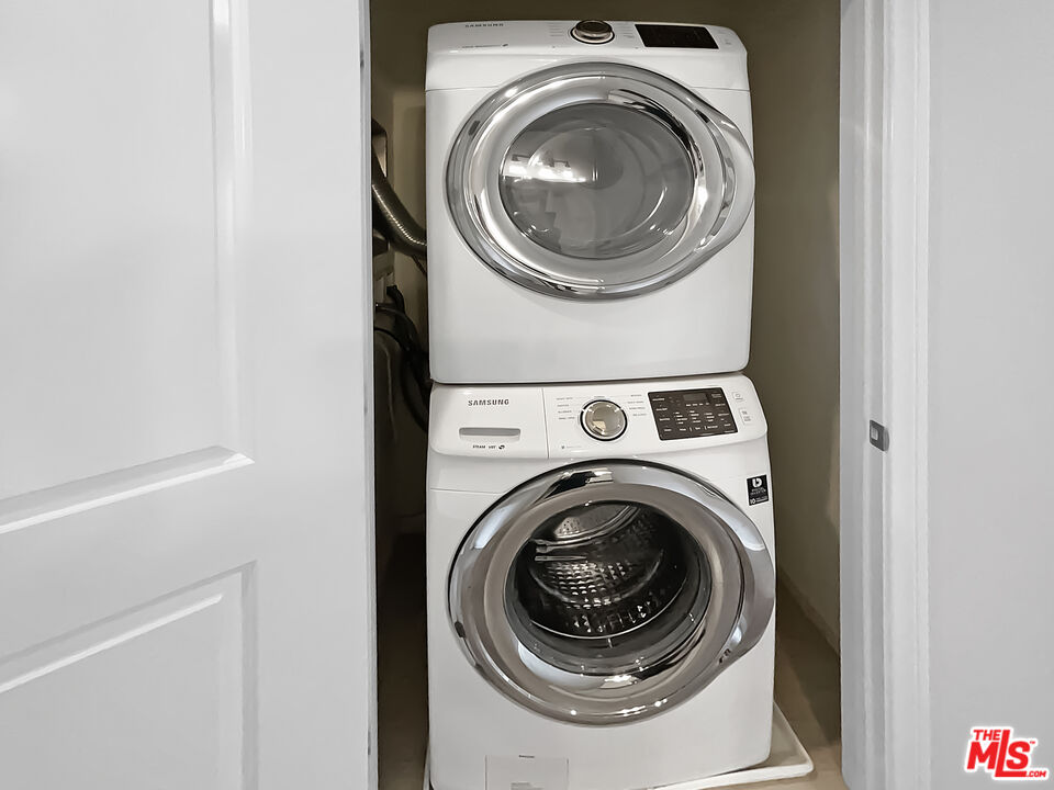 50 Evening Sun Irvine, CA 92620 - Photo 9 of 15 a utility room with dryer and washer