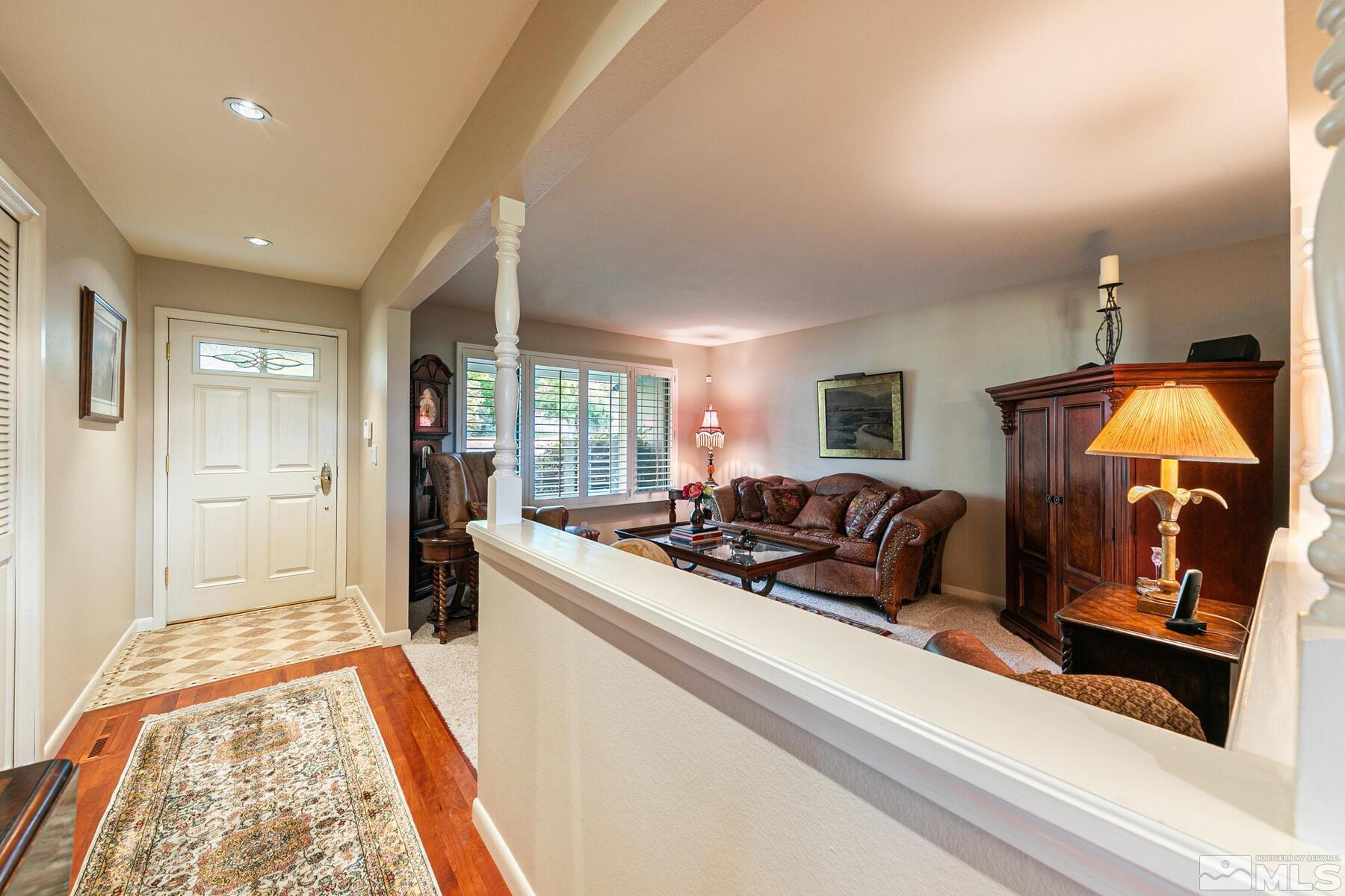 2025 Heatheridge Lane Reno, NV 89509 - Photo 19 of 40 a living room with furniture and a rug