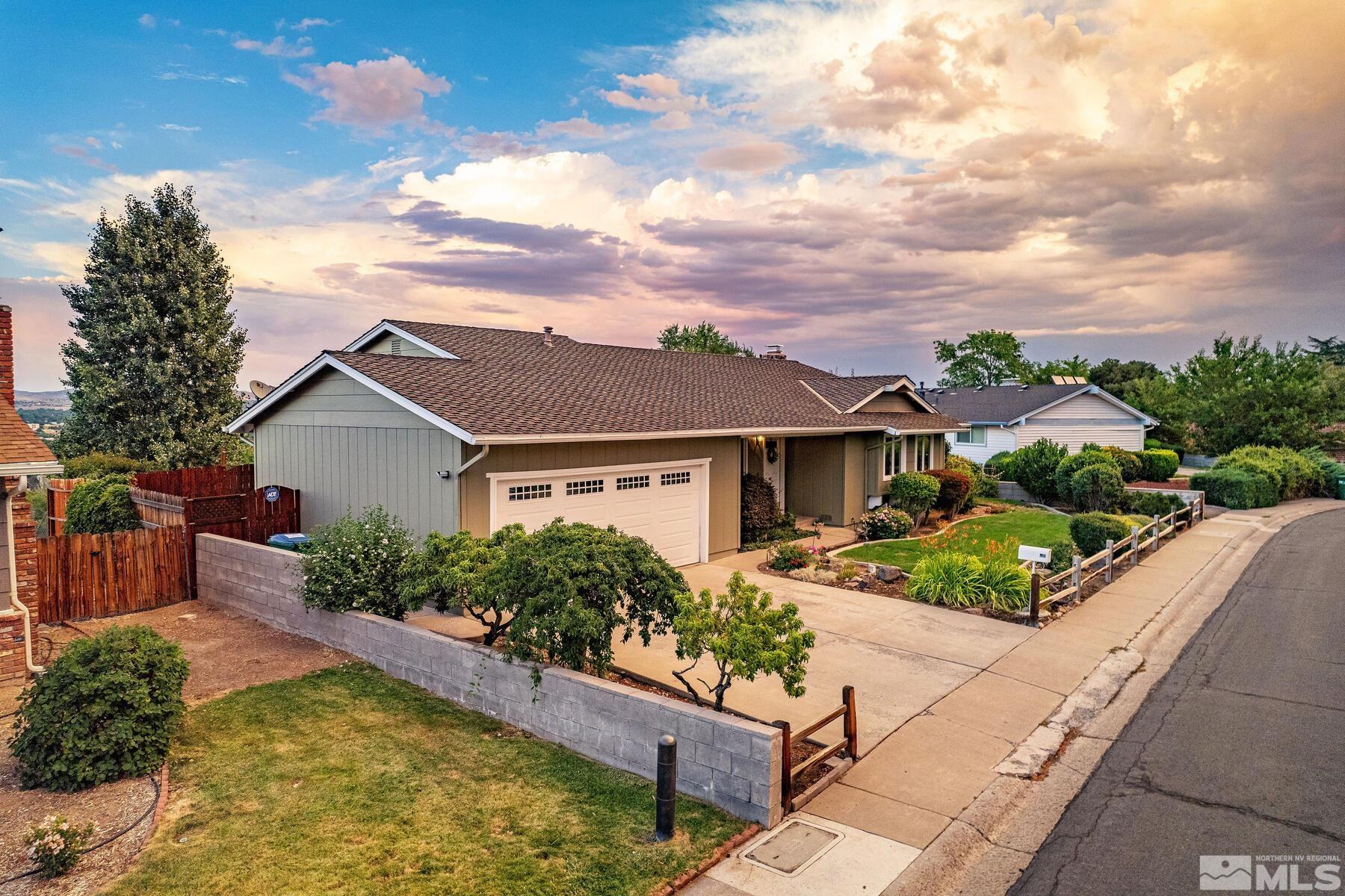2025 Heatheridge Lane Reno, NV 89509 - Photo 2 of 40 a view of a house with garden