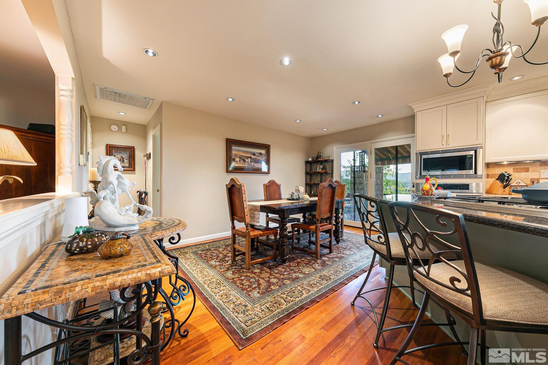 2025 Heatheridge Lane Reno, NV 89509 - Photo 31 of 40 a view of a dining room with furniture