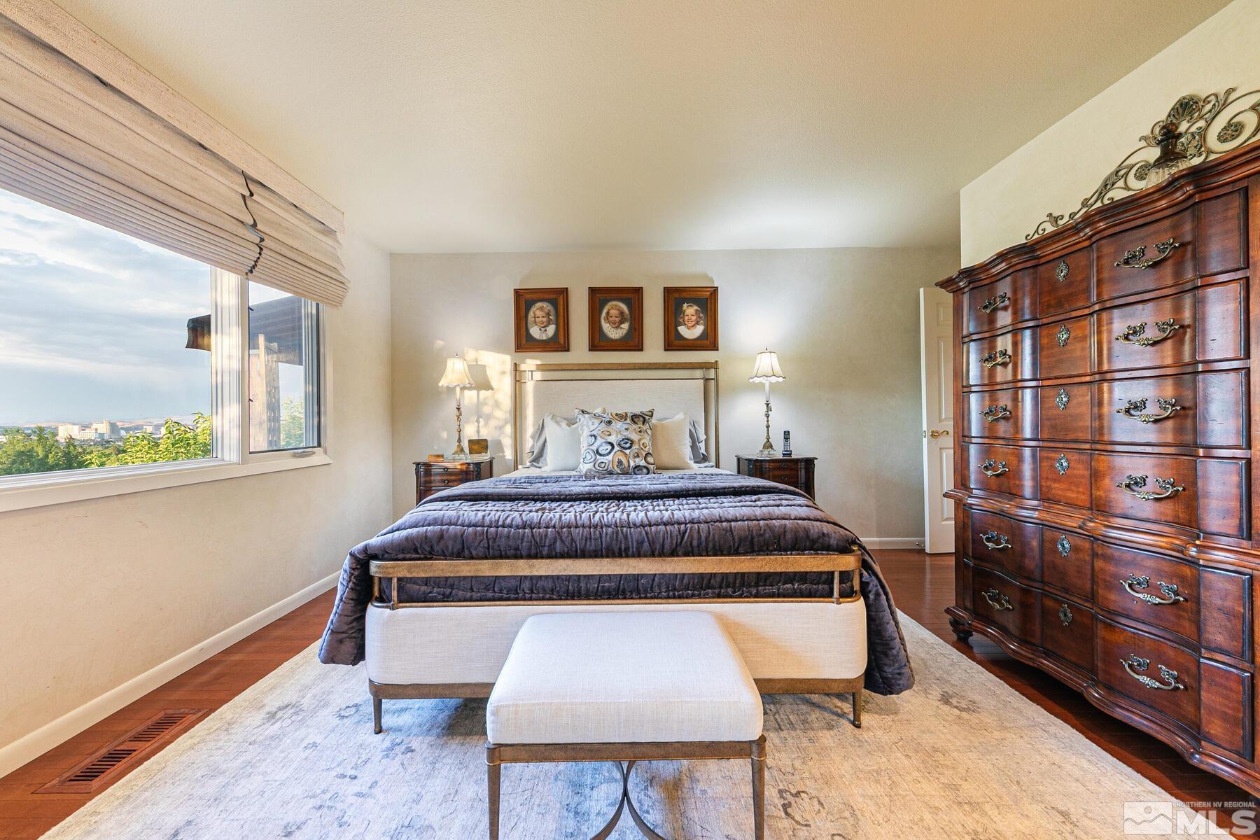 2025 Heatheridge Lane Reno, NV 89509 - Photo 33 of 40 a bedroom with a bed and window