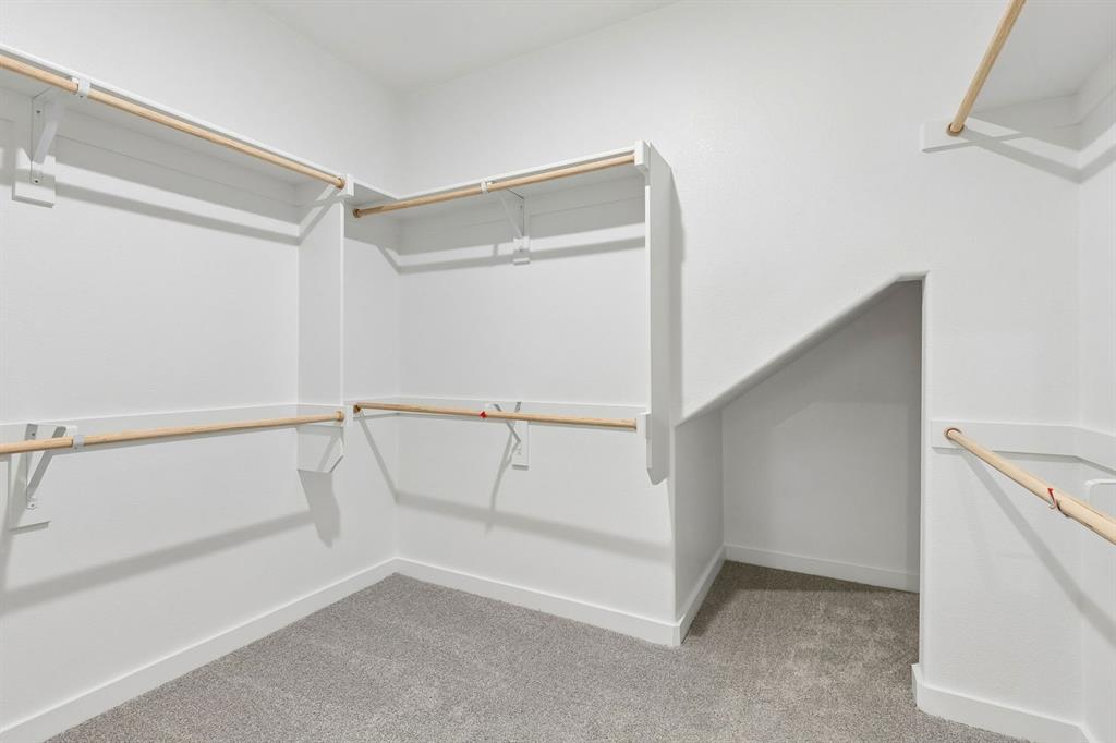 1121 Del Rio Drive Lavon, TX 75166 - Photo 17 of 32 a view of an empty walk in closet