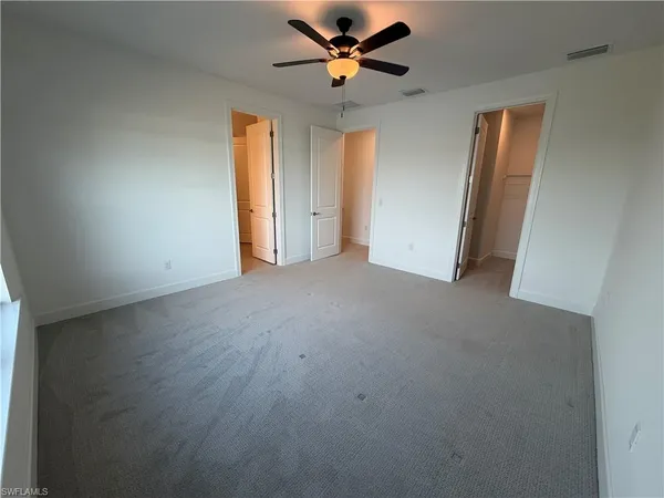 a view of a room with racks on the wall