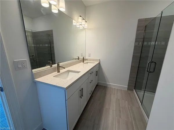 a bathroom with a sink toilet and vanity