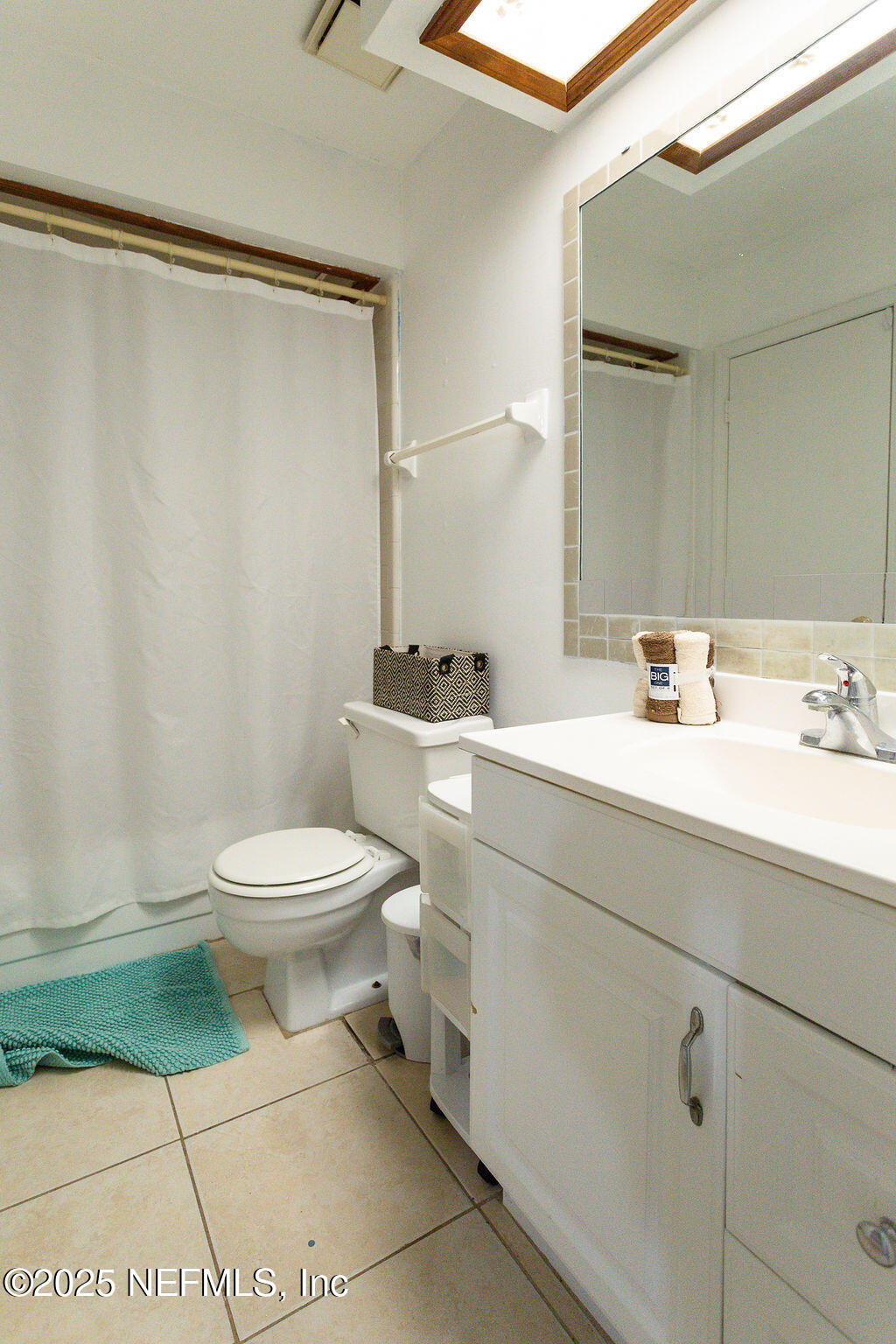 5328 Arlington Road Jacksonville, FL 32211 - Photo 15 of 16 a bathroom with a sink toilet and shower