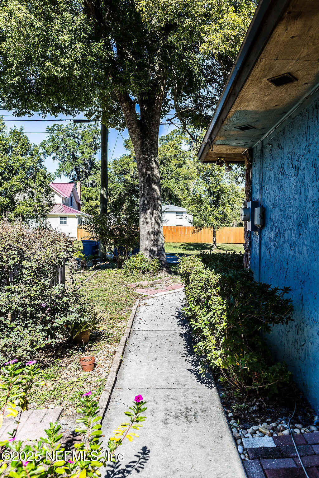 5328 Arlington Road Jacksonville, FL 32211 - Photo 4 of 16 a backyard of a house with outdoor seating