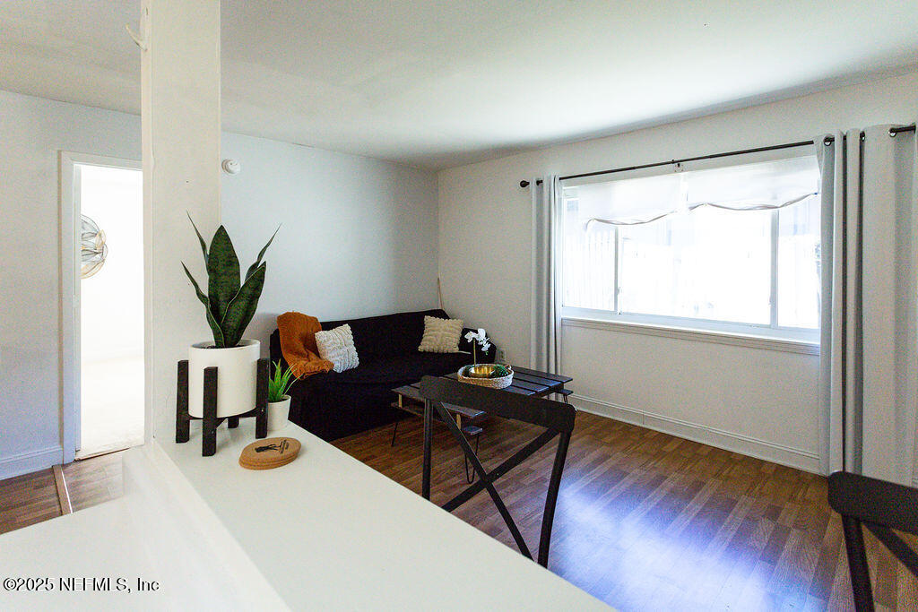 5328 Arlington Road Jacksonville, FL 32211 - Photo 8 of 16 a living room with furniture and a potted plant