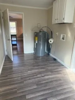 a view of a kitchen from the hallway