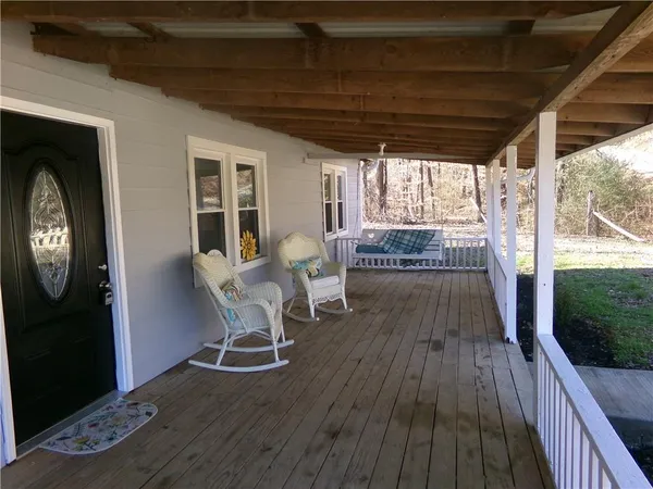 a dining room with furniture window wooden floor