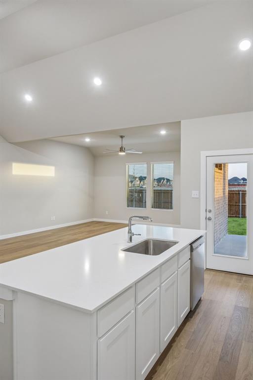 1404 Companero Street Haslet, TX 76052 - Photo 11 of 40 Kitchen in the Wimbledon home plan by Trophy Signature Homes – REPRESENTATIVE PHOTO