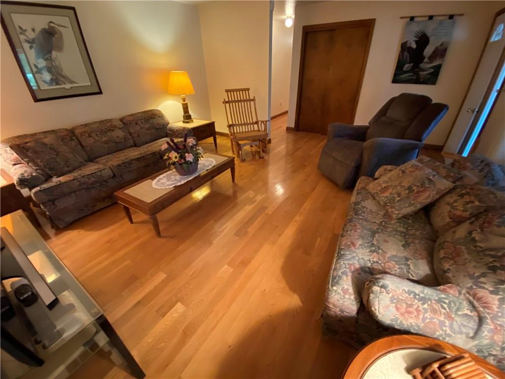 97 Gibson Road Greenville, PA 16125 - Photo 14 of 23 Living room with hardwood floors.
