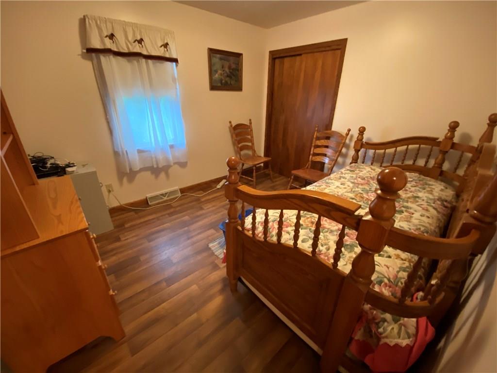 97 Gibson Road Greenville, PA 16125 - Photo 21 of 23 Bedroom has hardwood under vinyl flooring/ lift and remove if desired