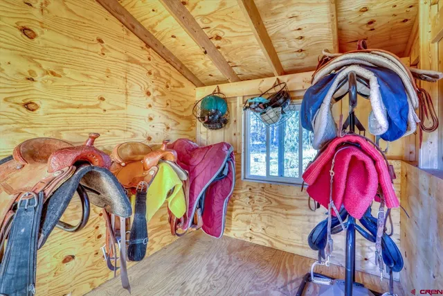 a view of a door and a car parked