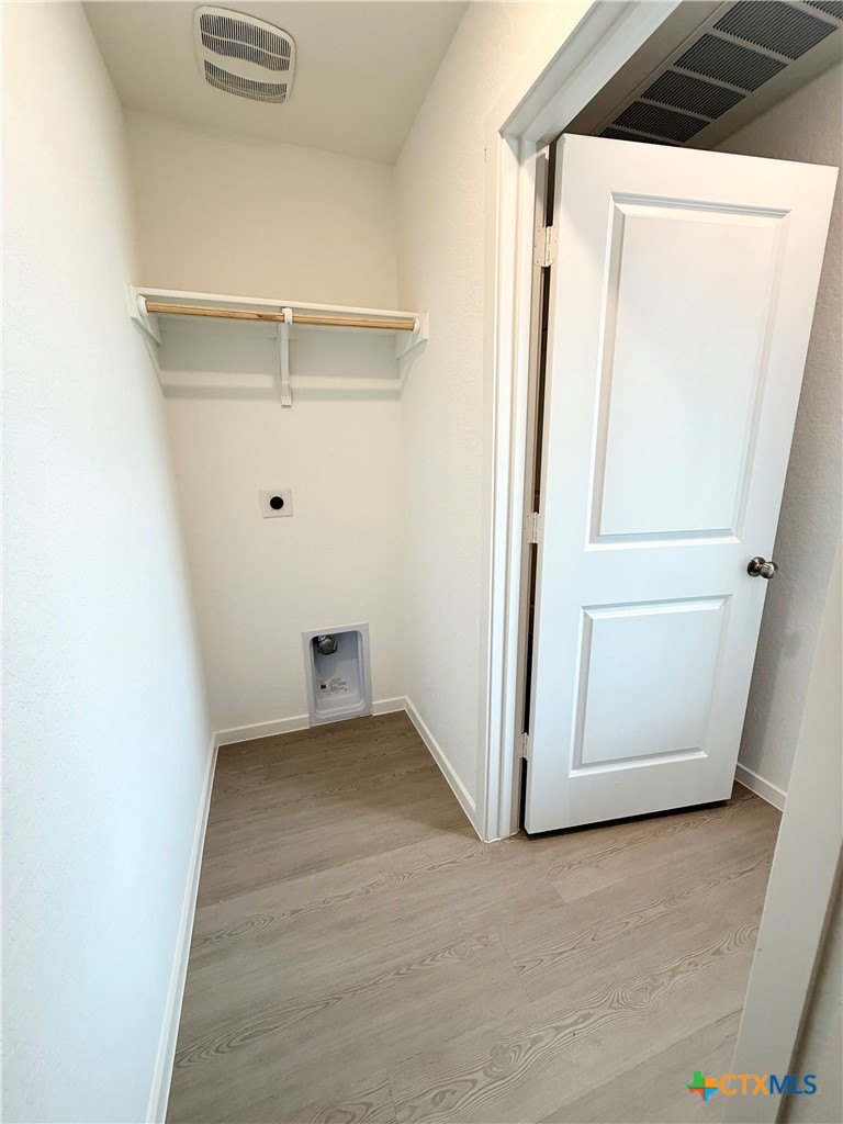 413 Moscato Road New Braunfels, TX 78130 - Photo 24 of 28 a view of a room with a hallway