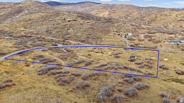 349 West Mountain View Road, Unit 349 Fairview, UT 84629 - Photo 9 of 26 Expansive parcel featuring a defined boundary, natural shrubbery, and a small outbuilding