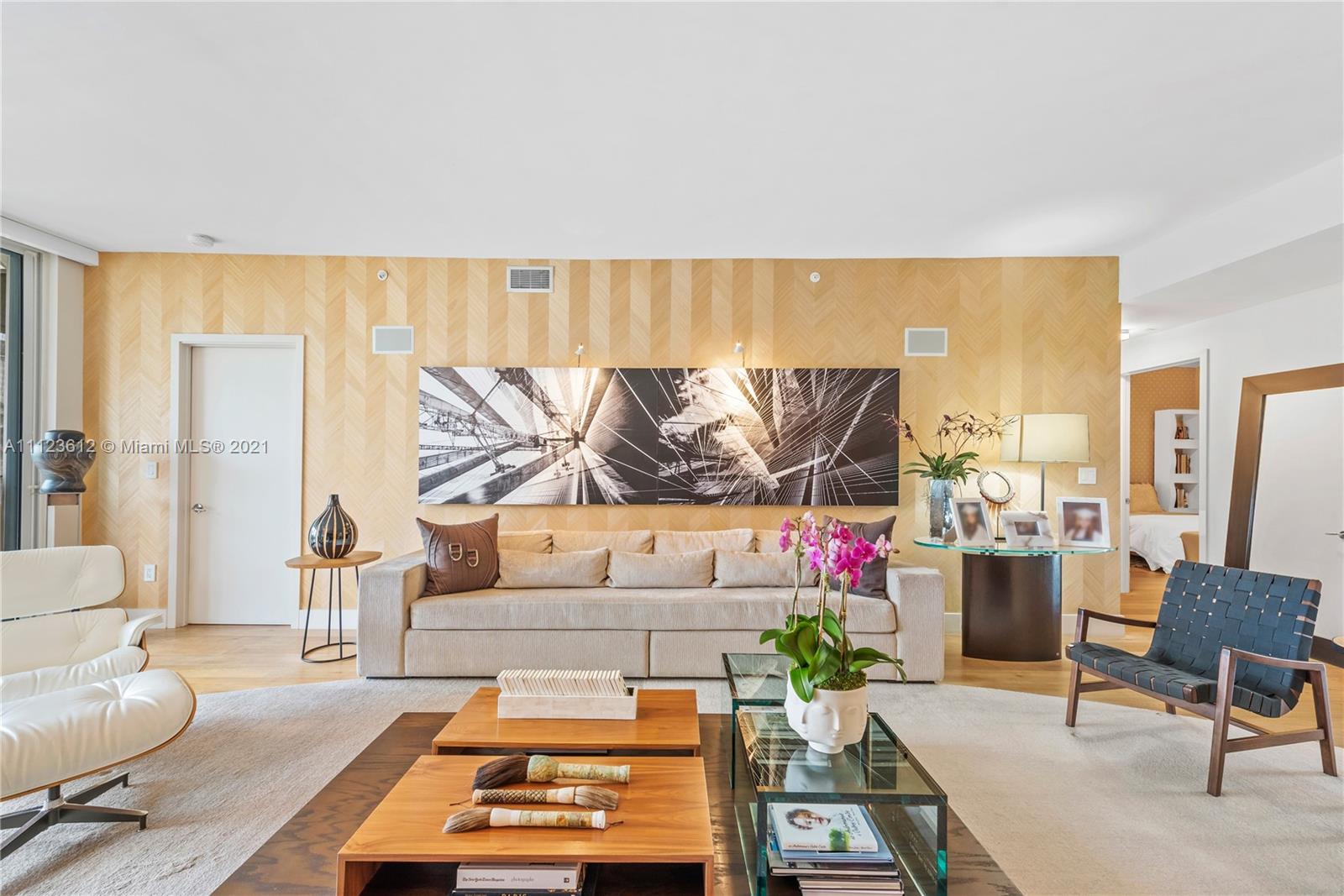 739 Crandon Boulevard, Unit PH1 Key Biscayne, FL 33149 - Photo 2 of 33 a living room with furniture and a couch