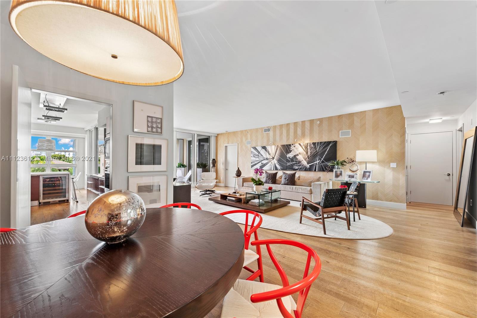 739 Crandon Boulevard, Unit PH1 Key Biscayne, FL 33149 - Photo 11 of 33 a living room with furniture and kitchen view