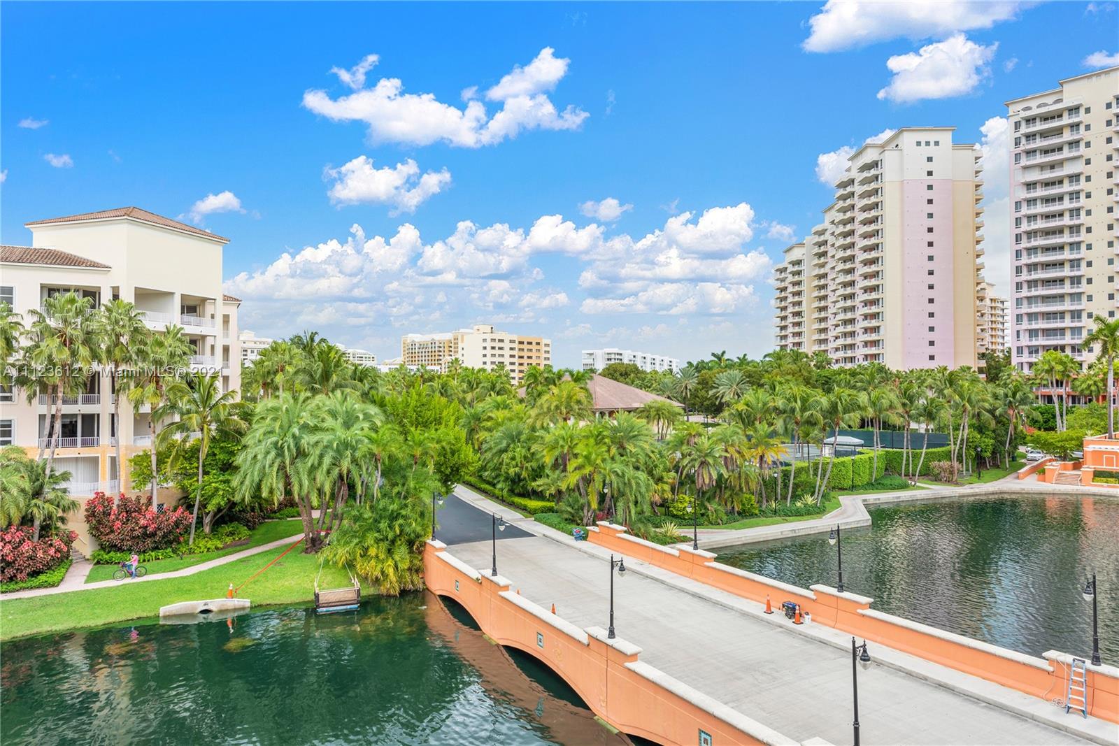 739 Crandon Boulevard, Unit PH1 Key Biscayne, FL 33149 - Photo 31 of 33 a view of a lake with a city
