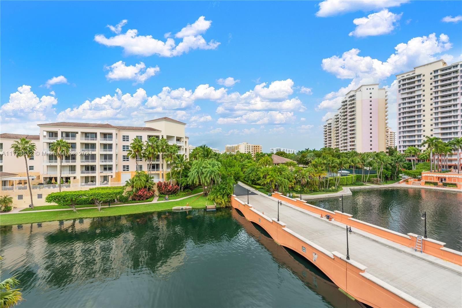 739 Crandon Boulevard, Unit PH1 Key Biscayne, FL 33149 - Photo 32 of 33 a view of swimming pool with outdoor seating and lake view