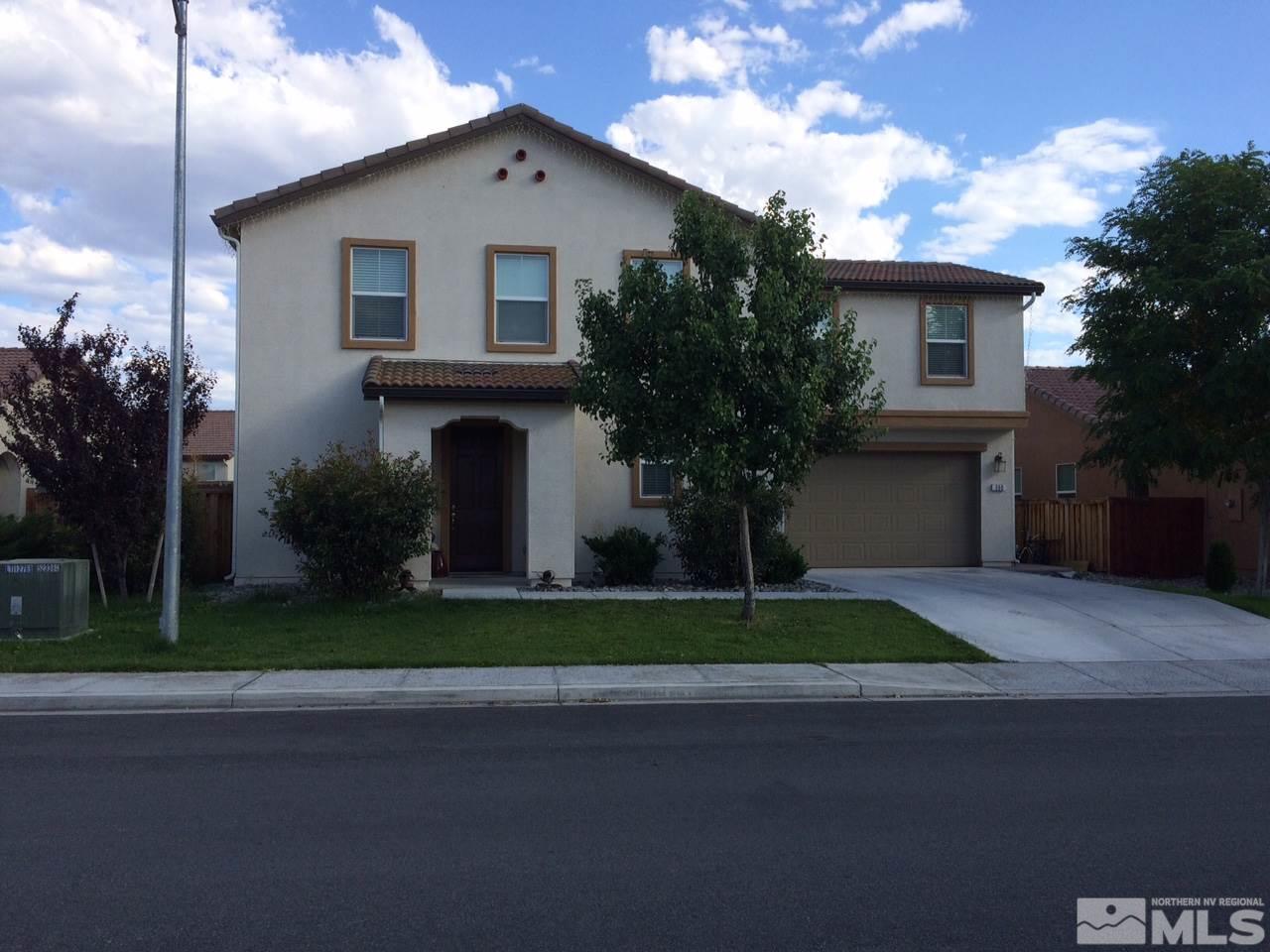 350 Pesaro Way Reno, NV 89521 - Photo 1 of 1 a front view of a house with garden