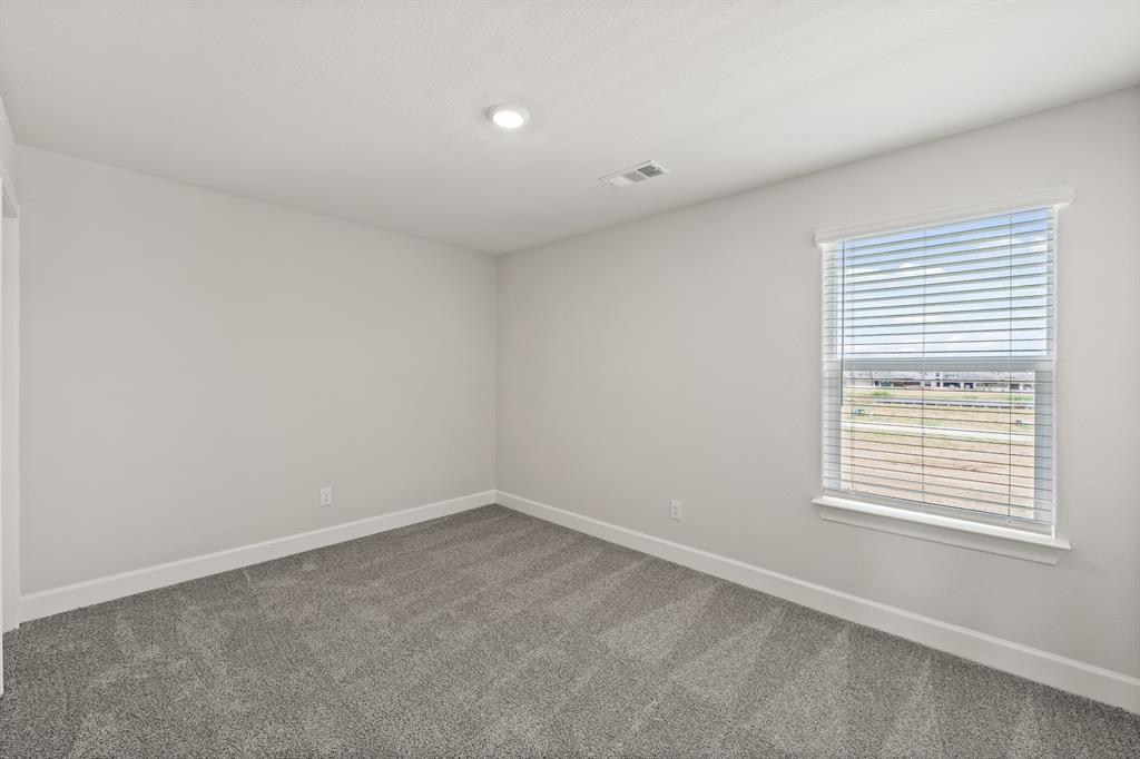 443 MB's Way Pilot Point, TX 76258 - Photo 6 of 8 an empty room with a window