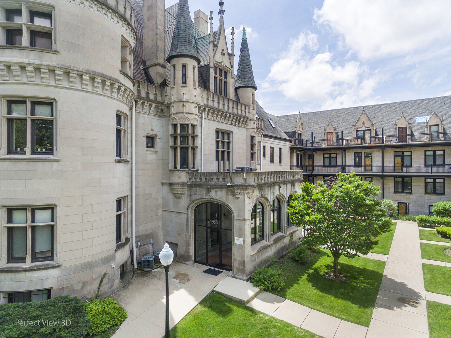 4938 South Drexel Boulevard, Unit 310 Chicago, IL 60615 - Photo 1 of 20 a view of a building with a yard in front of it