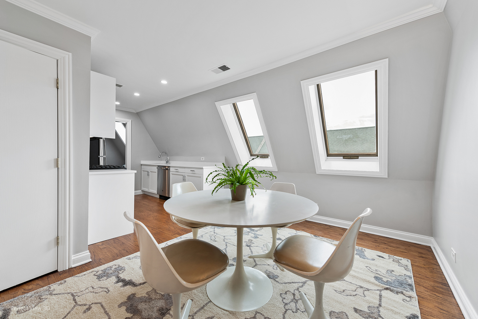 4938 South Drexel Boulevard, Unit 310 Chicago, IL 60615 - Photo 11 of 20 a dining room with furniture and wooden floor