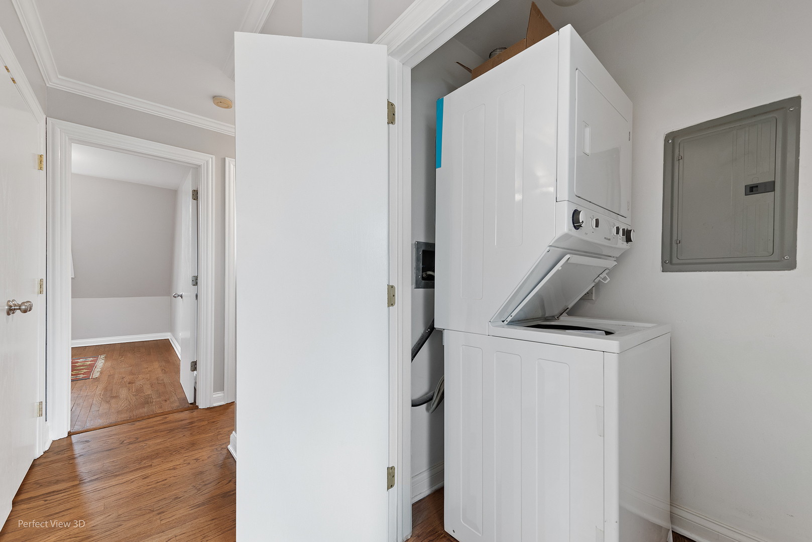 4938 South Drexel Boulevard, Unit 310 Chicago, IL 60615 - Photo 13 of 20 a view of storage and utility room with wooden floor