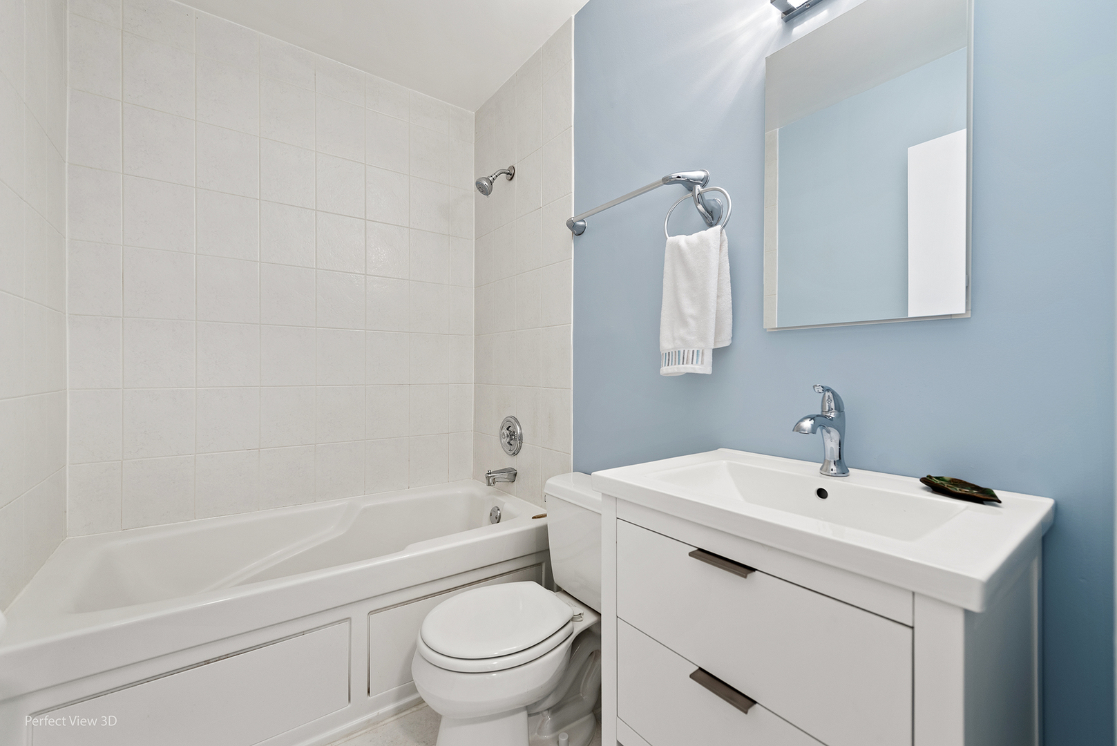 4938 South Drexel Boulevard, Unit 310 Chicago, IL 60615 - Photo 15 of 20 a bathroom with a sink a toilet and shower