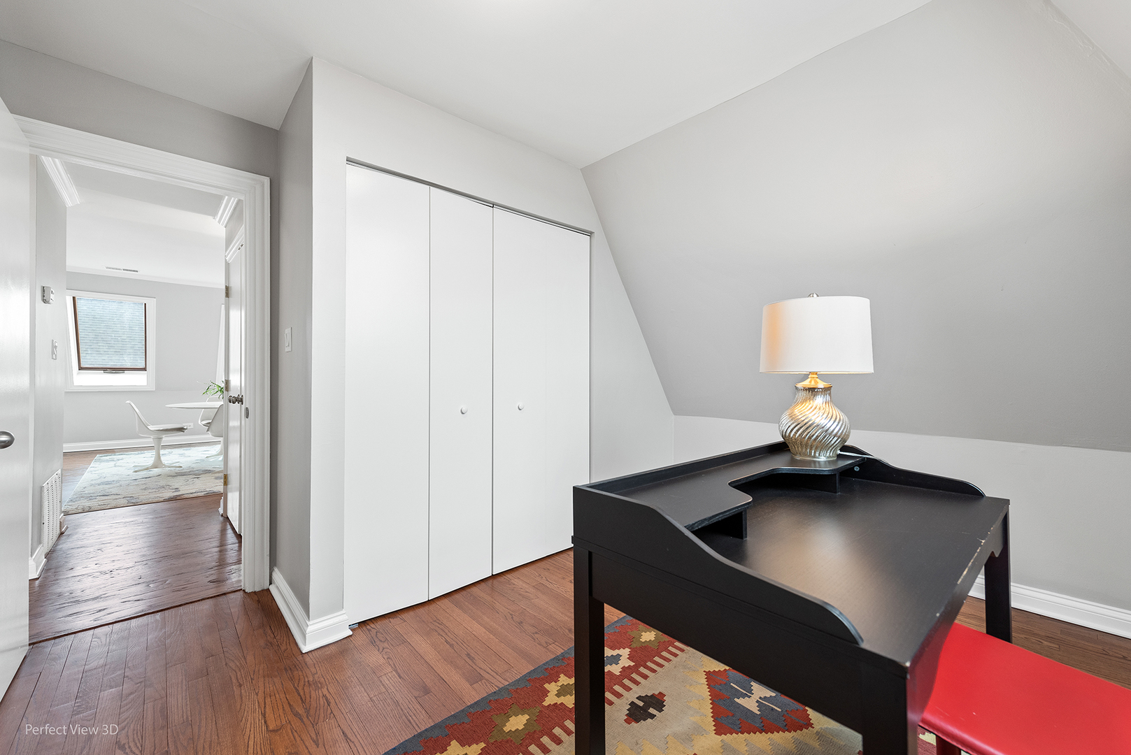 4938 South Drexel Boulevard, Unit 310 Chicago, IL 60615 - Photo 19 of 20 a view of a workspace with furniture and wooden floor