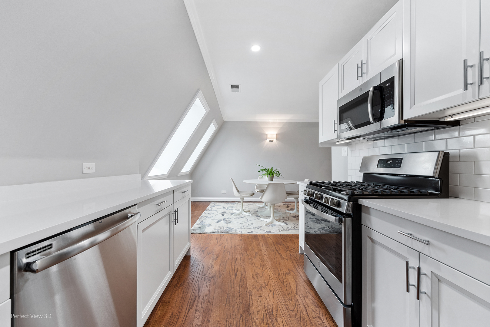 4938 South Drexel Boulevard, Unit 310 Chicago, IL 60615 - Photo 8 of 20 a kitchen with stainless steel appliances granite countertop a refrigerator a stove top oven a sink and dishwasher