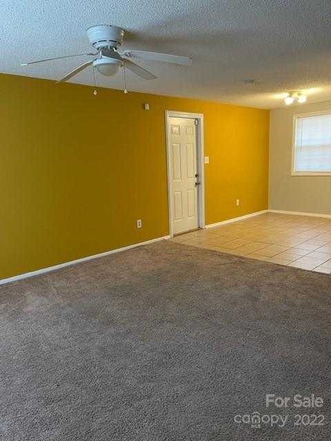 8129 Holly Hill Road Charlotte, NC 28227 - Photo 12 of 12 a view of an empty room with a window
