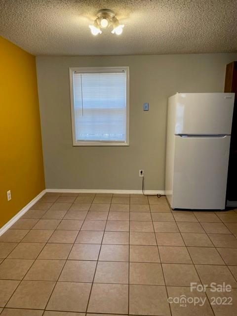 8129 Holly Hill Road Charlotte, NC 28227 - Photo 5 of 12 a view of an empty room