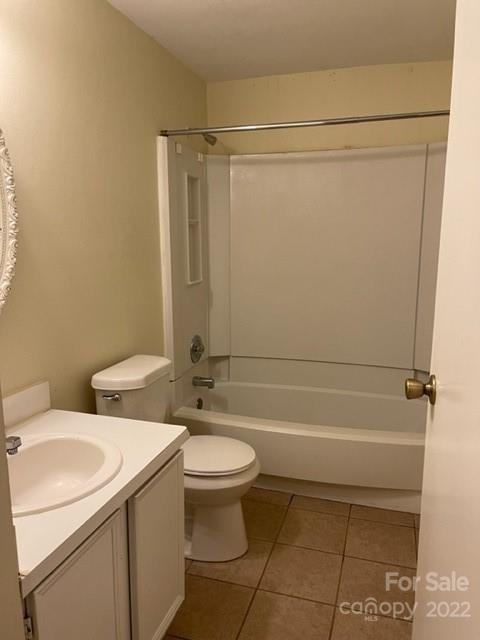 8129 Holly Hill Road Charlotte, NC 28227 - Photo 10 of 12 a bathroom with a sink a toilet and shower