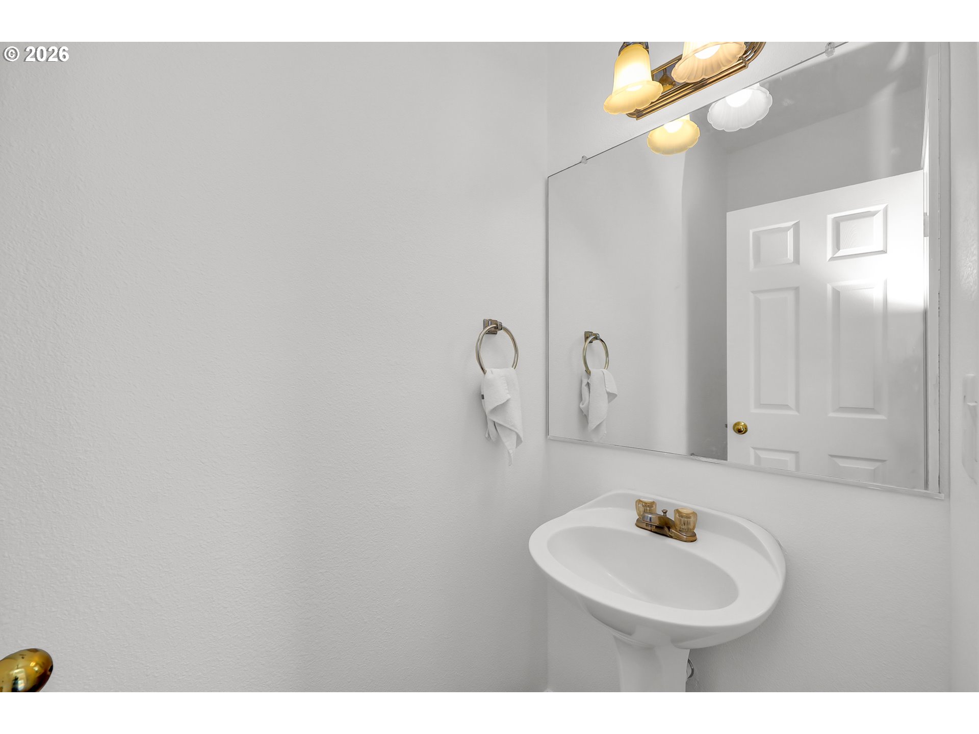 3906 Century Drive Eugene, OR 97402 - Photo 13 of 33 a bathroom with a sink and mirror