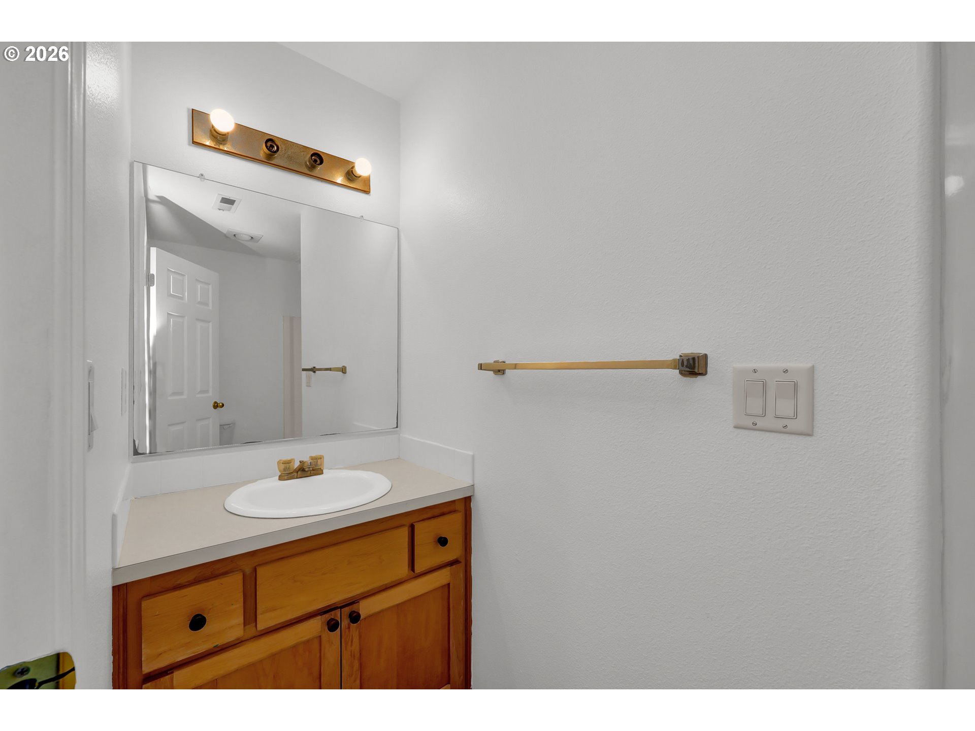 3906 Century Drive Eugene, OR 97402 - Photo 24 of 33 a bathroom with a sink and a mirror